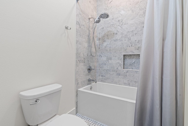 full bathroom with toilet and shower / bath combo with shower curtain