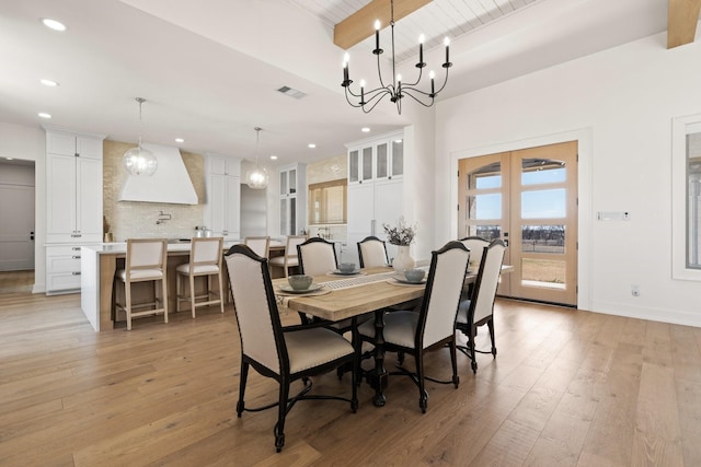 dining area with recessed lighting, visible vents, french doors, light wood finished floors, and beamed ceiling