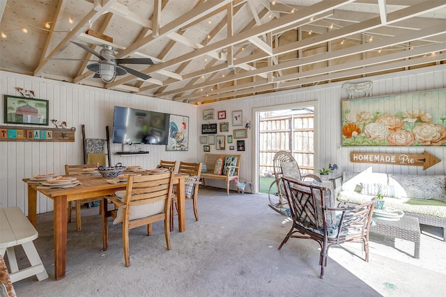 dining room featuring a ceiling fan and lofted ceiling