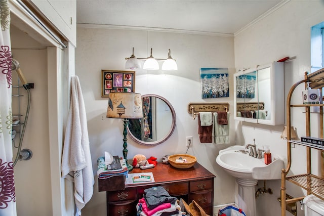 bathroom with crown molding