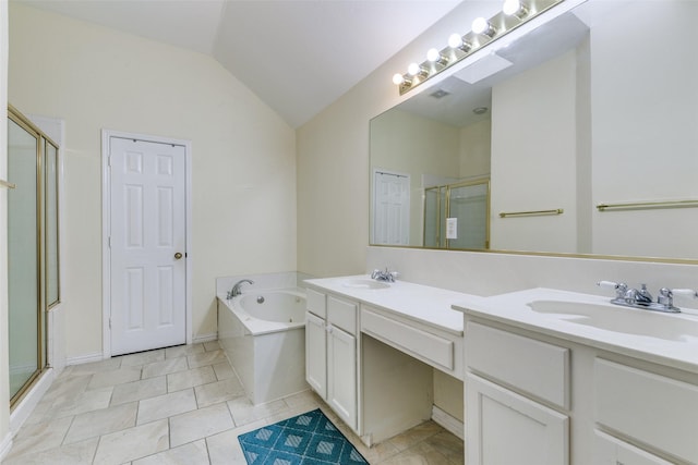 bathroom with a stall shower, lofted ceiling, a sink, and a bath