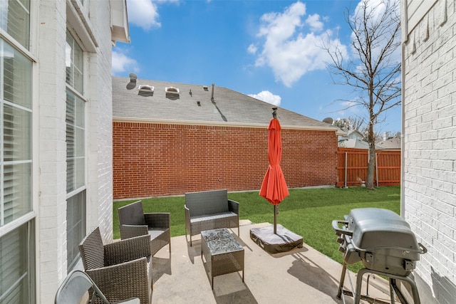 view of patio / terrace featuring an outdoor hangout area, grilling area, and fence