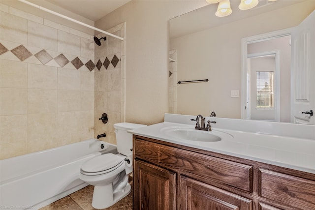 bathroom featuring toilet,  shower combination, and vanity