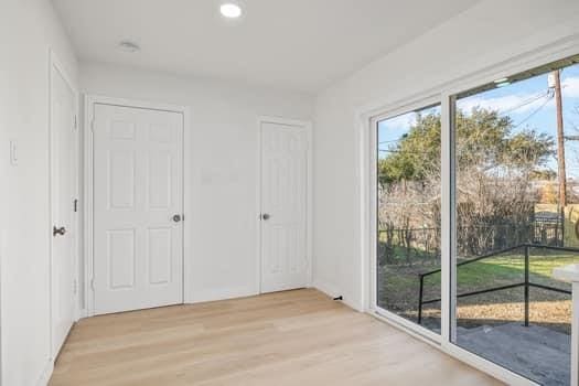 doorway featuring light wood-style floors