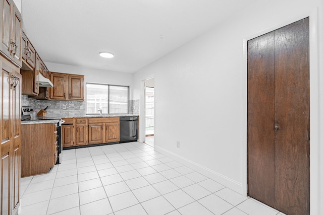 kitchen featuring tasteful backsplash, range with electric cooktop, brown cabinetry, dishwasher, and light countertops