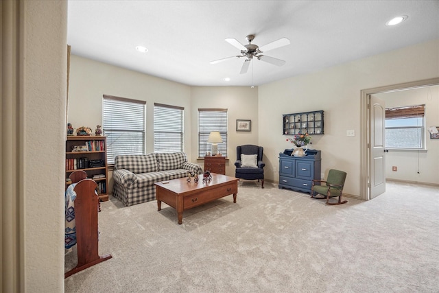 living room featuring ceiling fan, baseboards, carpet flooring, and recessed lighting