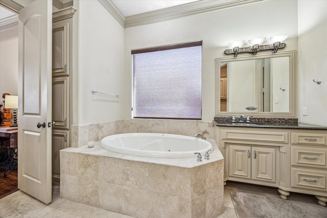 full bath featuring a whirlpool tub, tile patterned floors, ornamental molding, and vanity