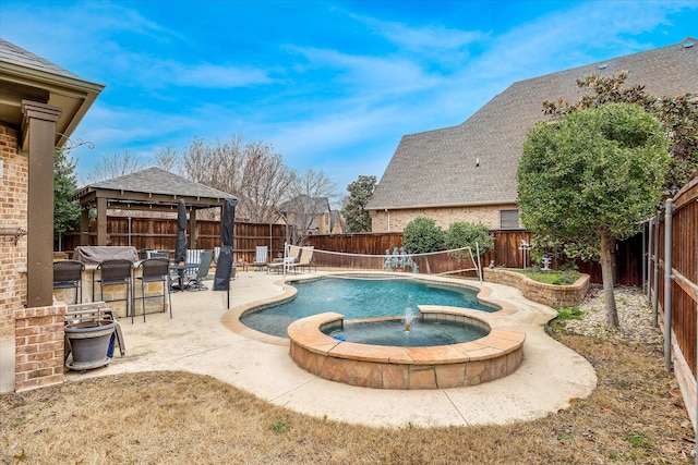 view of pool with a fenced backyard, a patio, and a gazebo