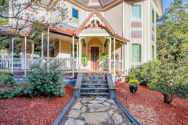 entrance to property with a porch