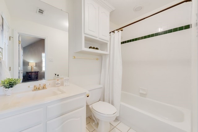 bathroom with toilet, vanity, visible vents, tile patterned floors, and shower / bath combo with shower curtain