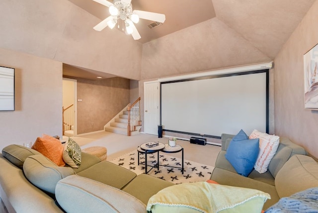 cinema with carpet floors, a baseboard radiator, lofted ceiling, visible vents, and a ceiling fan