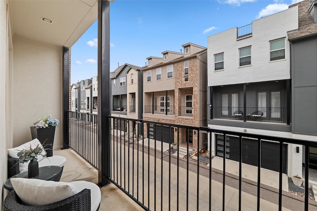 balcony featuring a residential view