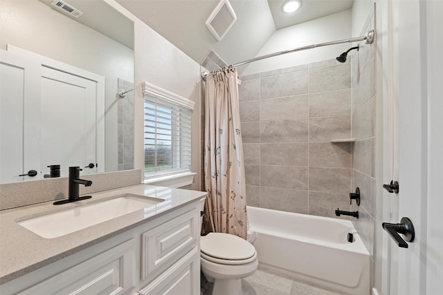 bathroom featuring toilet, vanity, shower / bath combo with shower curtain, and visible vents