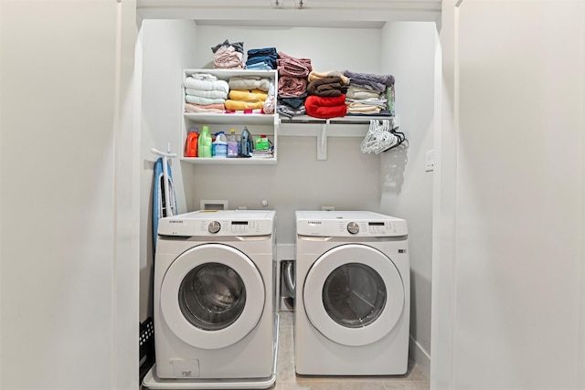 laundry area with laundry area and washer and dryer