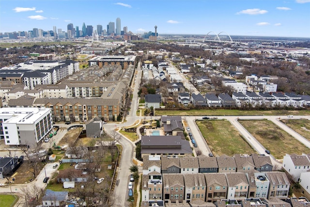 birds eye view of property featuring a city view