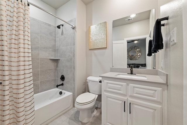 bathroom featuring visible vents, vanity, toilet, and shower / bathtub combination with curtain