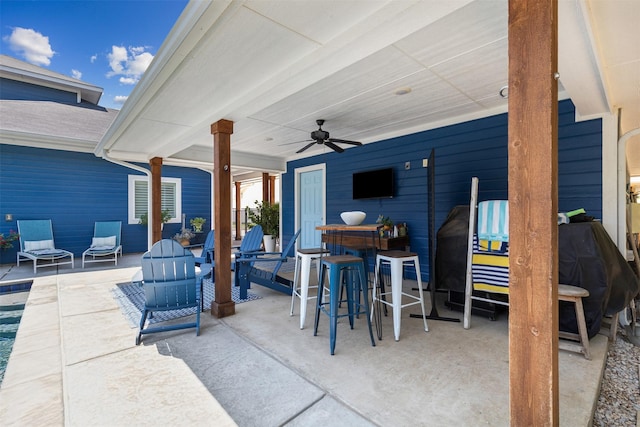 view of patio with ceiling fan