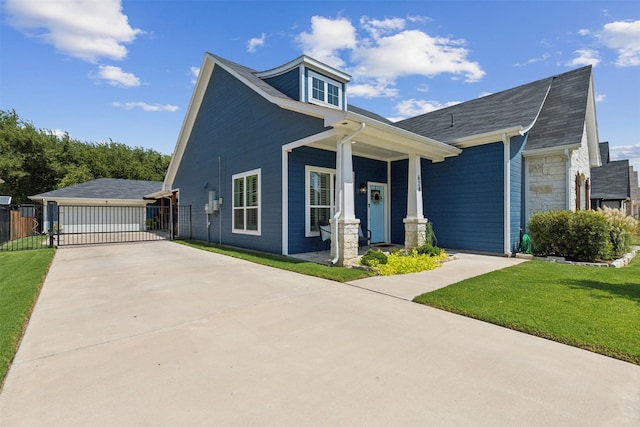 view of front of house featuring stone siding, fence, and a front lawn