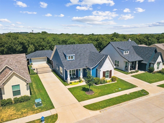 view of front facade featuring stone siding, a front lawn, and a porch