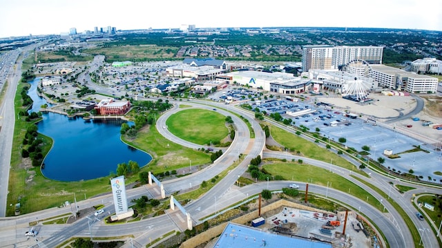 bird's eye view featuring a water view and a view of city