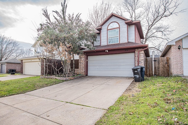 view of front of property featuring brick siding, a front yard, and fence