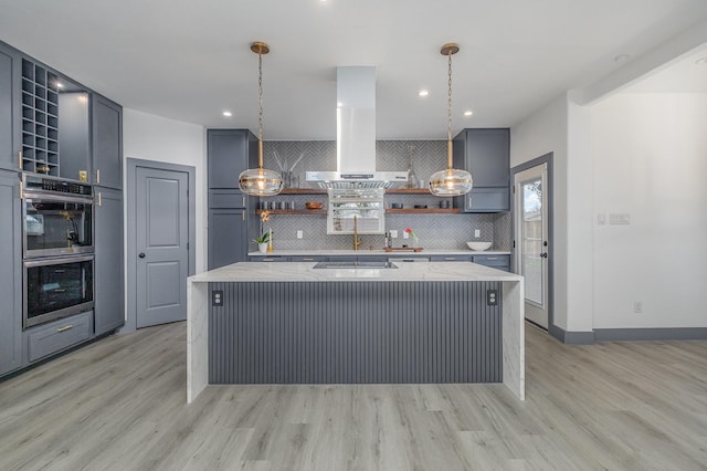 kitchen featuring stainless steel double oven, open shelves, light wood-type flooring, backsplash, and island range hood