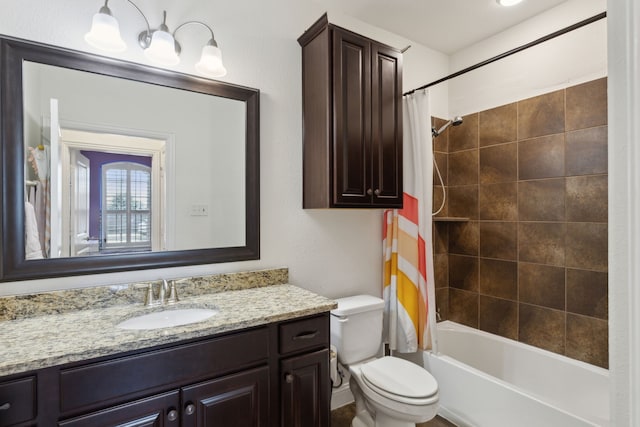 bathroom with toilet, shower / bath combo with shower curtain, and vanity