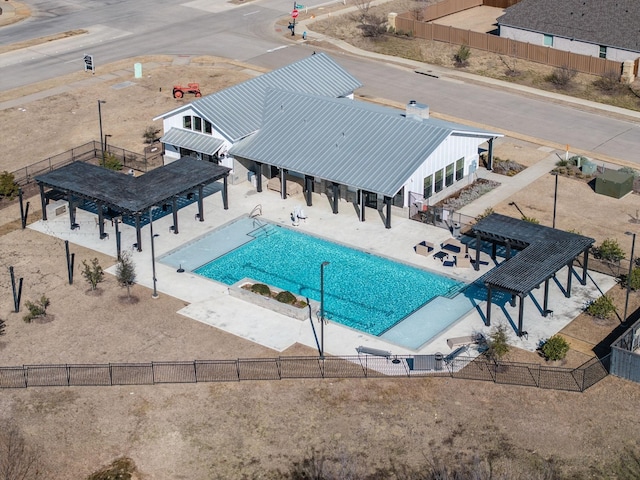 view of pool featuring a fenced in pool, a patio area, fence, and a pergola