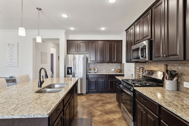 kitchen with backsplash, dark brown cabinets, stainless steel appliances, and a sink