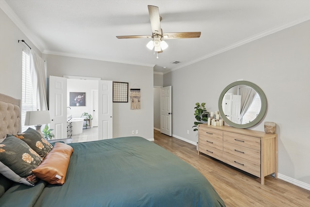 bedroom with light wood finished floors, baseboards, and crown molding