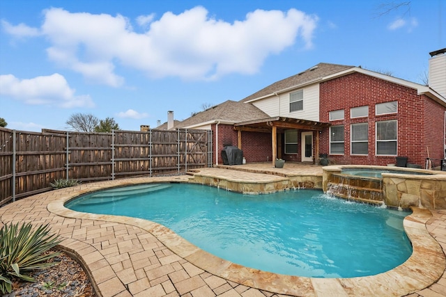 view of swimming pool featuring a fenced in pool, a patio, a fenced backyard, an in ground hot tub, and a grill