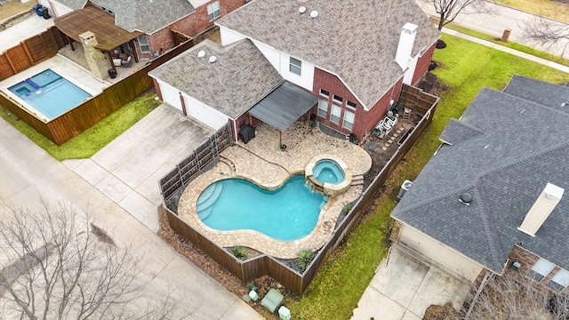 pool with a fenced backyard