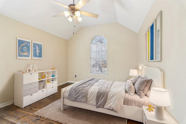 bedroom with lofted ceiling, ceiling fan, baseboards, and wood finished floors