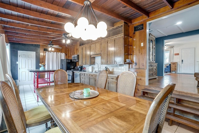 dining area with ceiling fan with notable chandelier, wood ceiling, beam ceiling, and light tile patterned floors