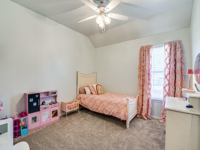 bedroom featuring a ceiling fan, lofted ceiling, and light colored carpet