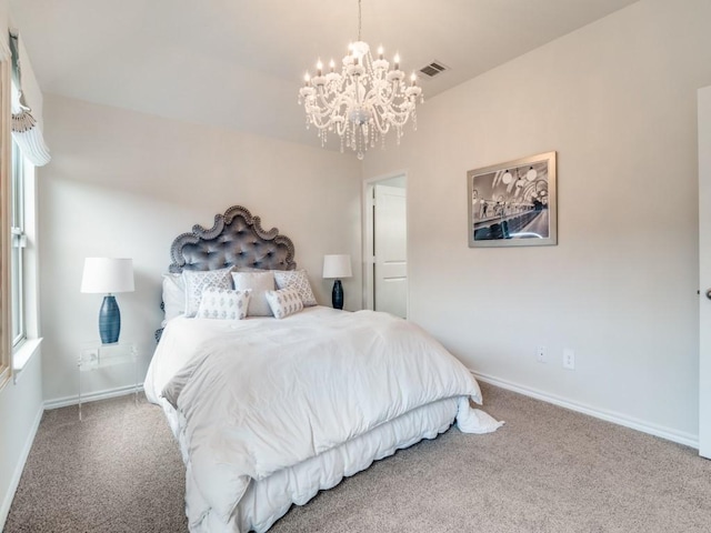 carpeted bedroom with a chandelier, visible vents, and baseboards