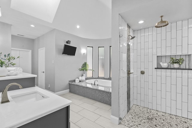 full bathroom with a garden tub, recessed lighting, visible vents, vanity, and walk in shower