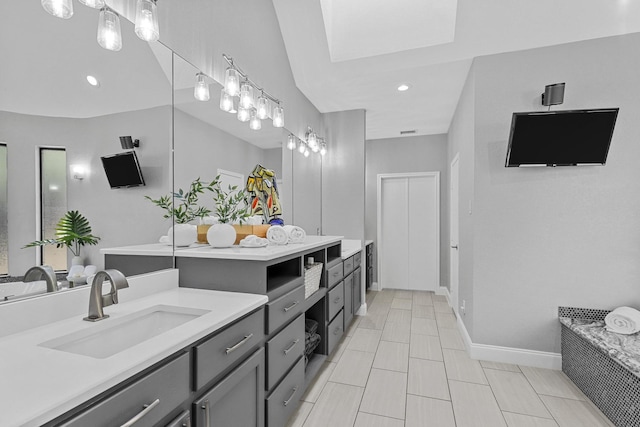 bathroom featuring recessed lighting, visible vents, vanity, baseboards, and a tub