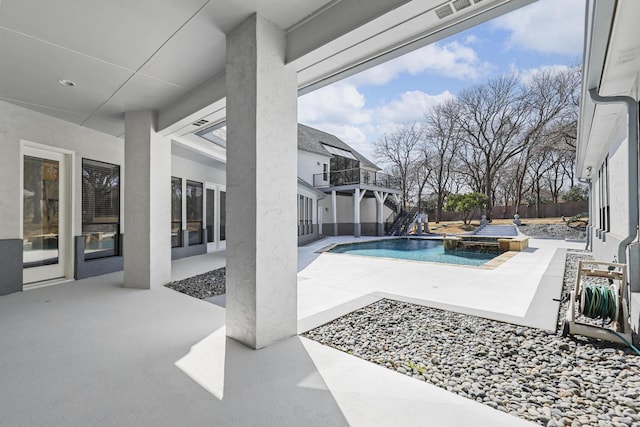 view of swimming pool with fence, stairway, a fenced in pool, and a patio