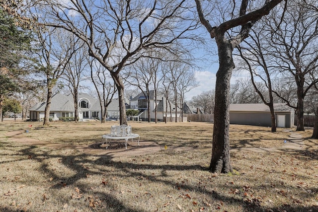 view of yard featuring fence