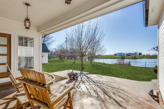 view of patio / terrace featuring a water view