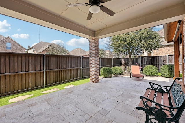 view of patio with a ceiling fan and a fenced backyard