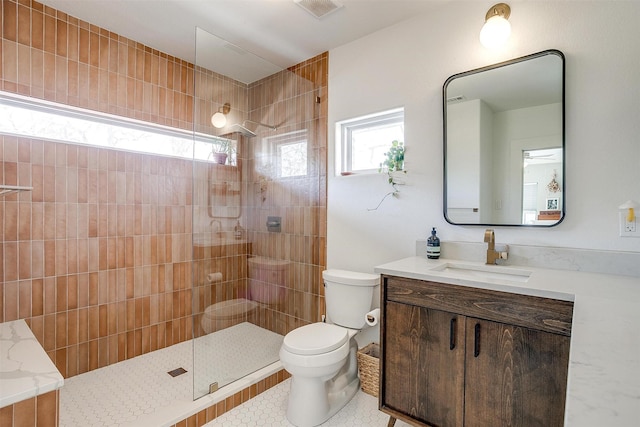 full bathroom featuring visible vents, vanity, toilet, and a healthy amount of sunlight