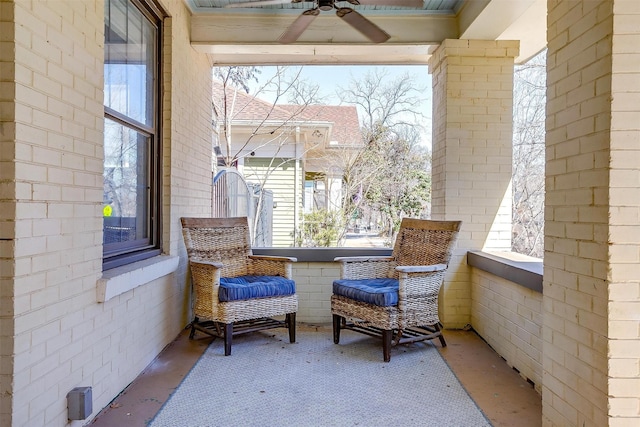 exterior space featuring ceiling fan