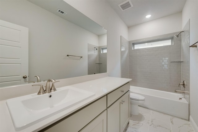 full bathroom featuring toilet, marble finish floor, vanity, and visible vents