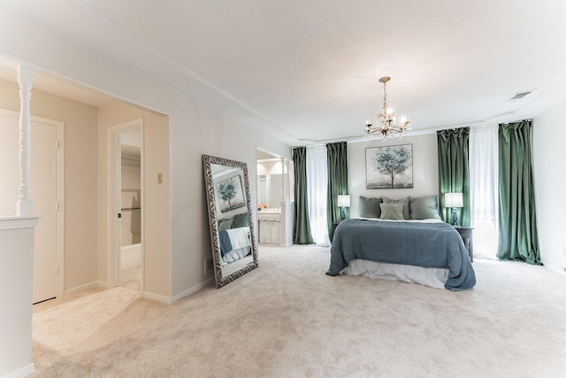 bedroom featuring ensuite bath, a notable chandelier, visible vents, and carpet flooring