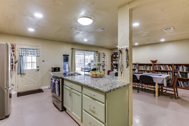 kitchen with finished concrete flooring, stainless steel appliances, visible vents, and light stone countertops