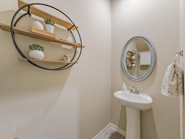 bathroom with baseboards