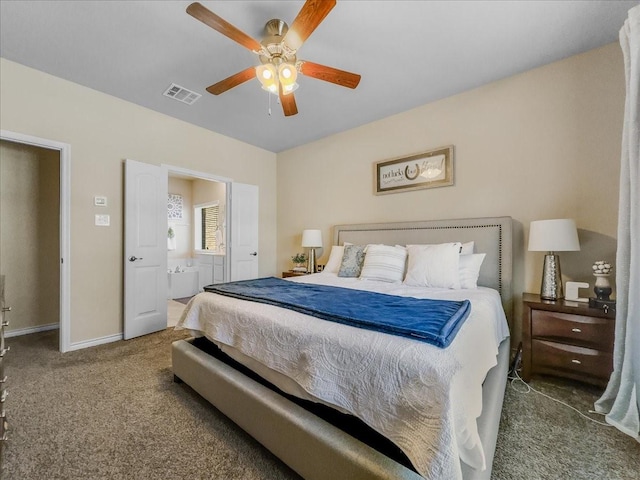 carpeted bedroom with baseboards, visible vents, ceiling fan, and connected bathroom