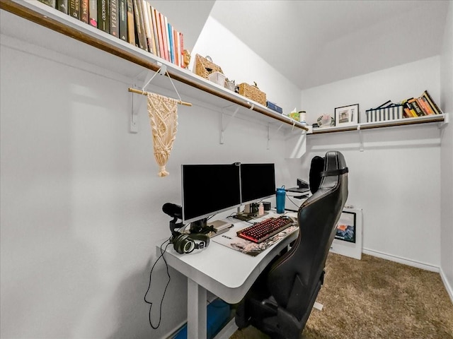 carpeted home office featuring baseboards